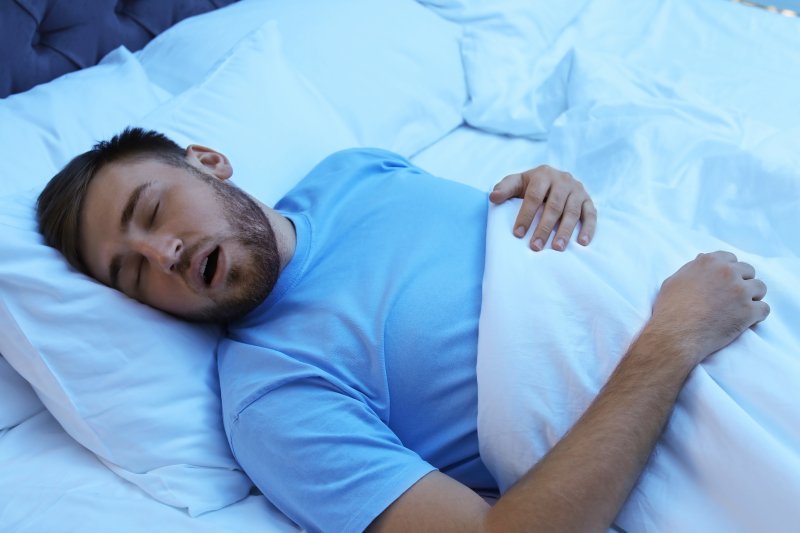 Sleeping man snores